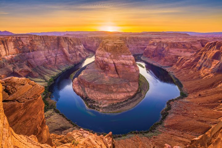 a canyon with a mountain in the background