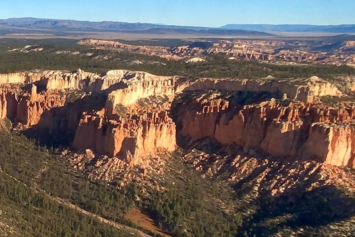 a canyon with a mountain in the background