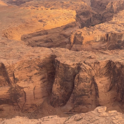a canyon with a mountain in the desert