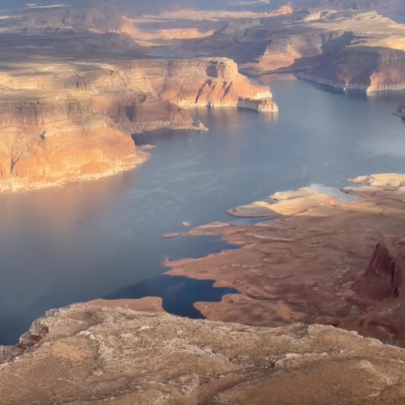 a canyon with a mountain in the background